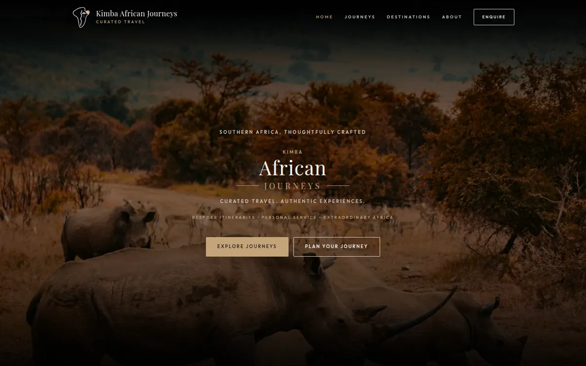 Kimba African Journeys homepage with rhinos on a bushveld track and gold Explore Journeys call to action